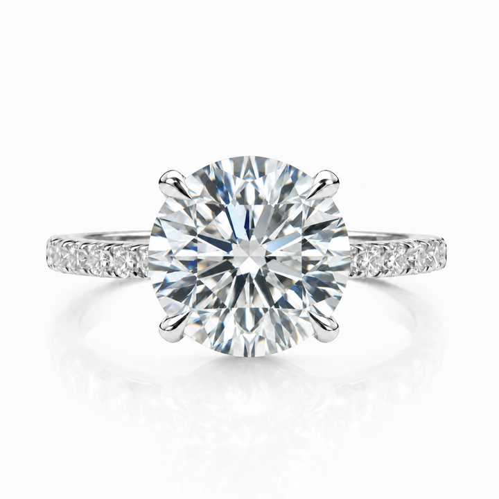 Engagement ring with a round brilliant lab-grown center diamond in white metal, front view.