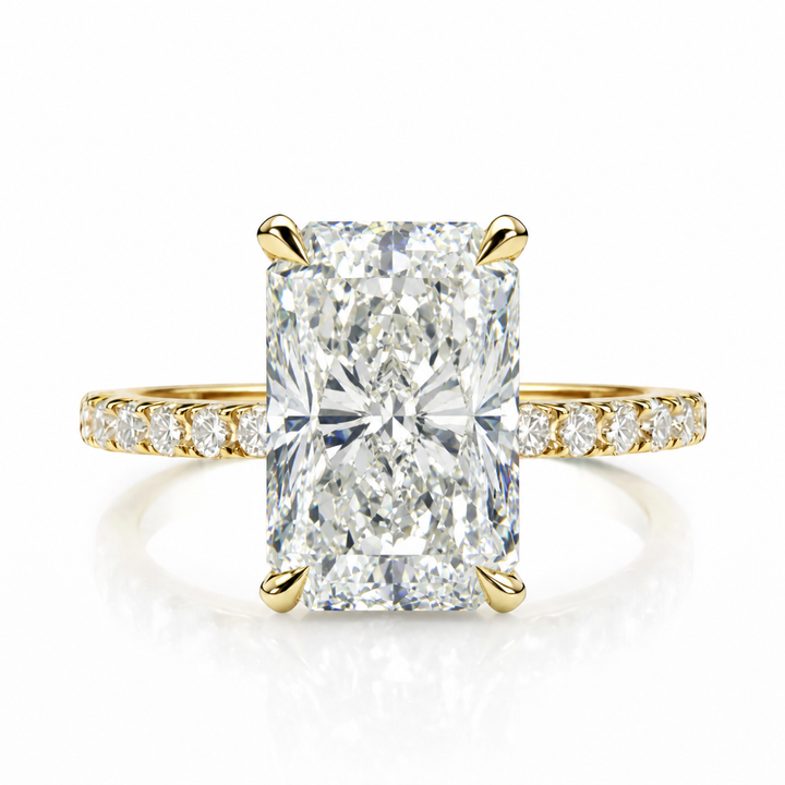 Engagement ring with a radiant-cut lab-grown center diamond in yellow gold, front view.