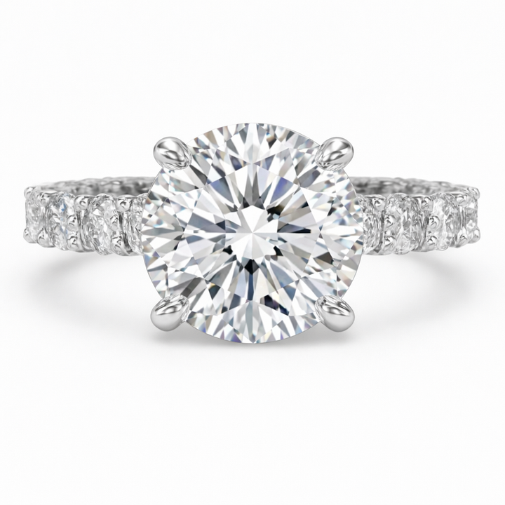Engagement ring with a round brilliant lab-grown center diamond in white metal, front view.