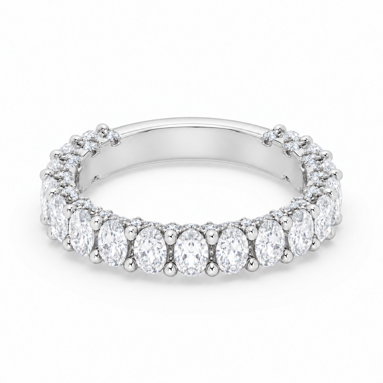 Olivia 3.4 mm platinum wedding band with elongated oval diamonds, approximately 75–80% diamond coverage and a smooth rear resizing bar