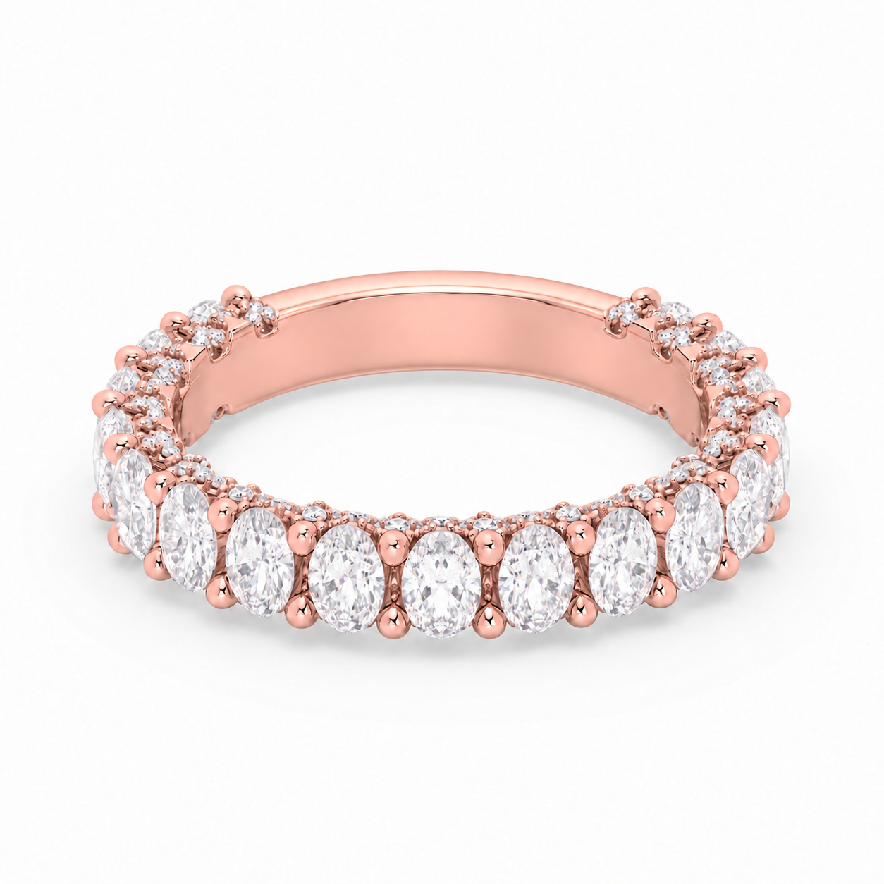 Olivia 3.4 mm rose gold wedding band with elongated oval diamonds, approximately 75–80% diamond coverage and a smooth rear resizing bar