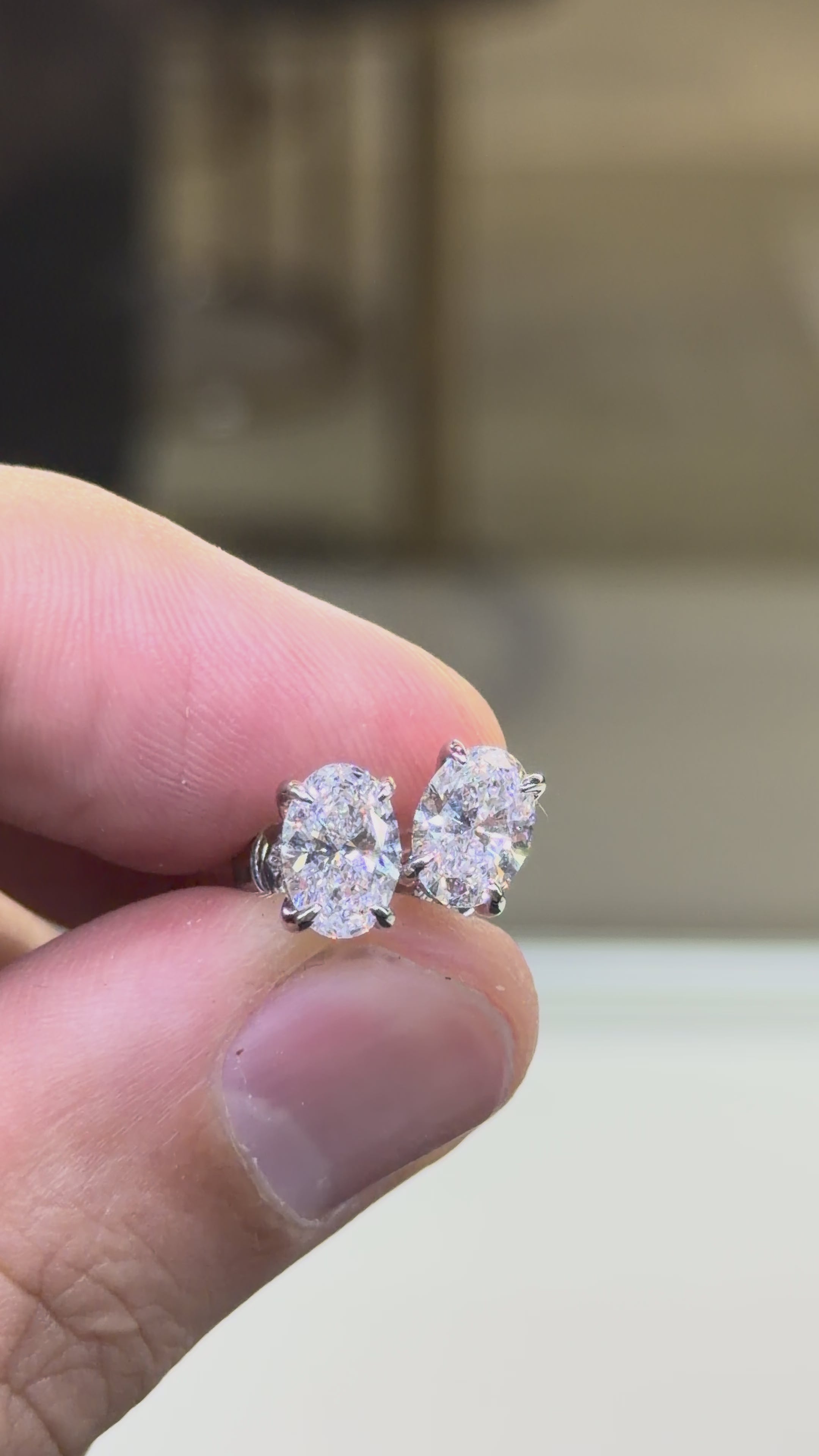 Oval Hidden Halo Stud Earrings