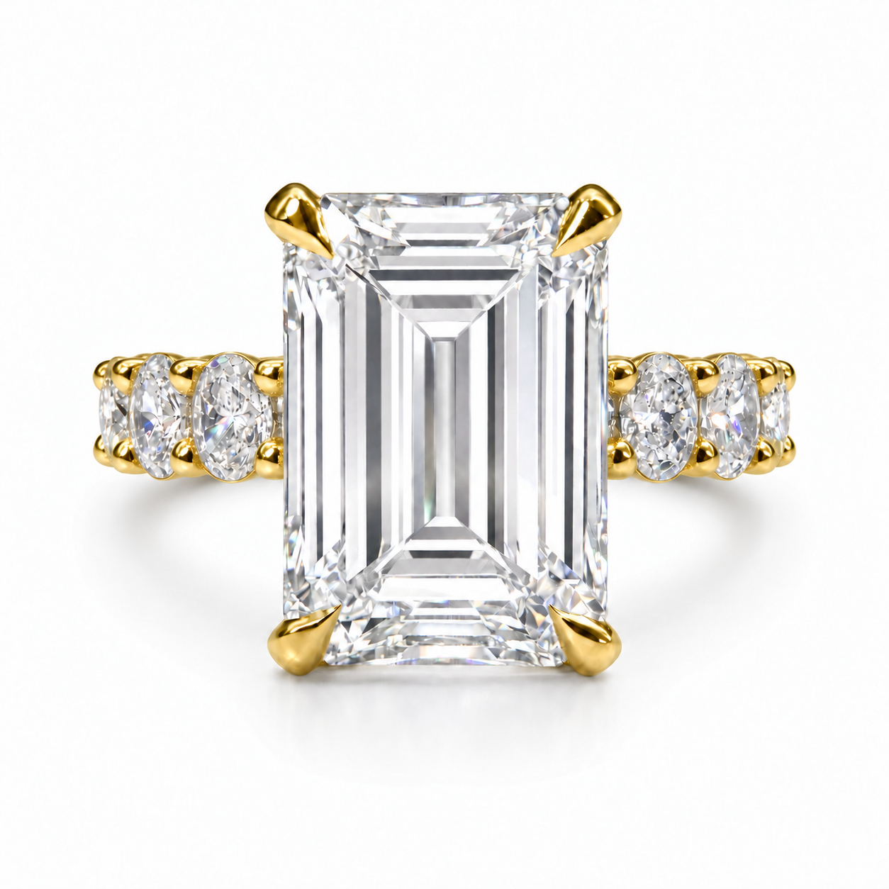 The 3MM Olivia engagement ring with an emerald lab-grown center diamond in yellow gold