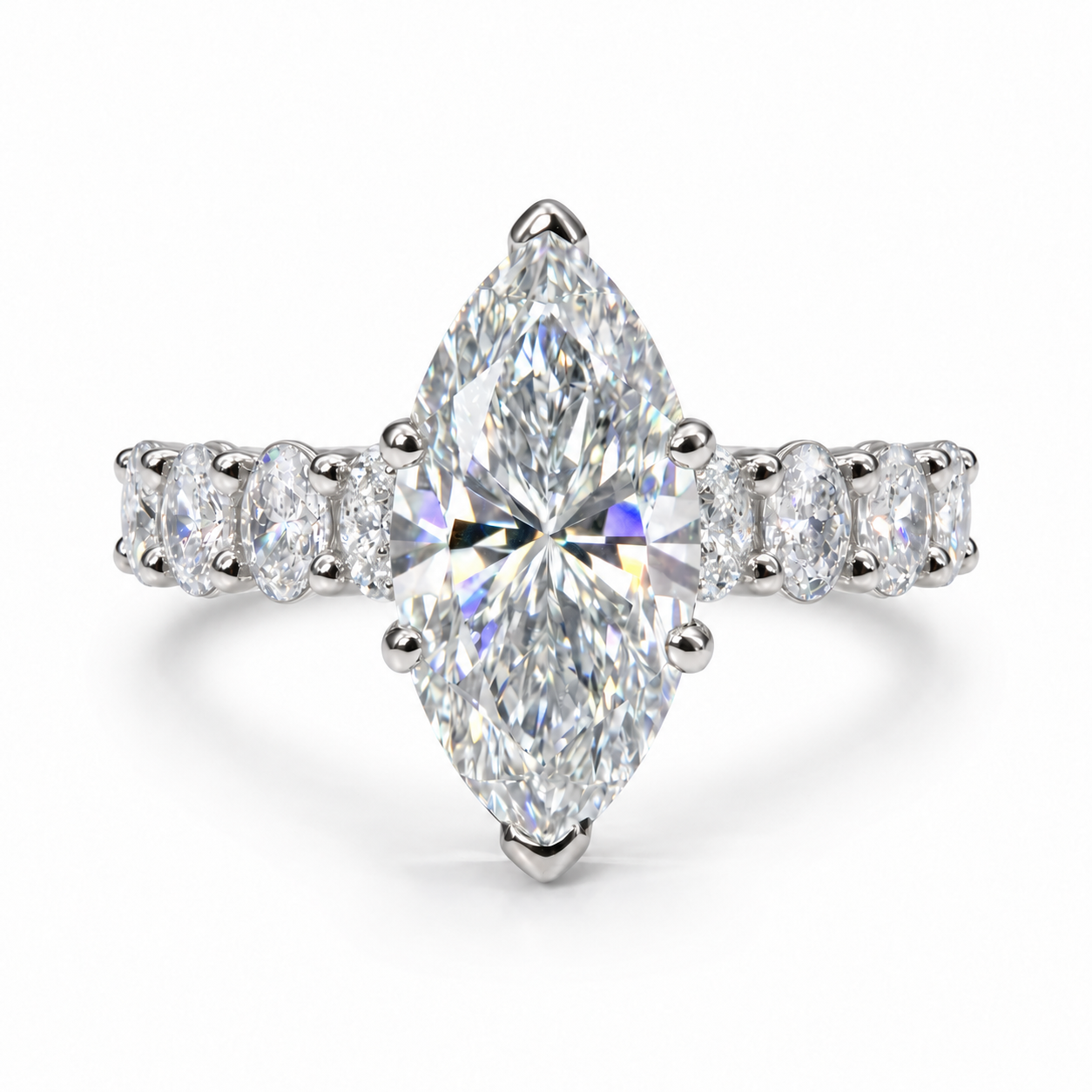 The 3MM Olivia engagement ring with a marquise lab-grown center diamond in a white-metal finish