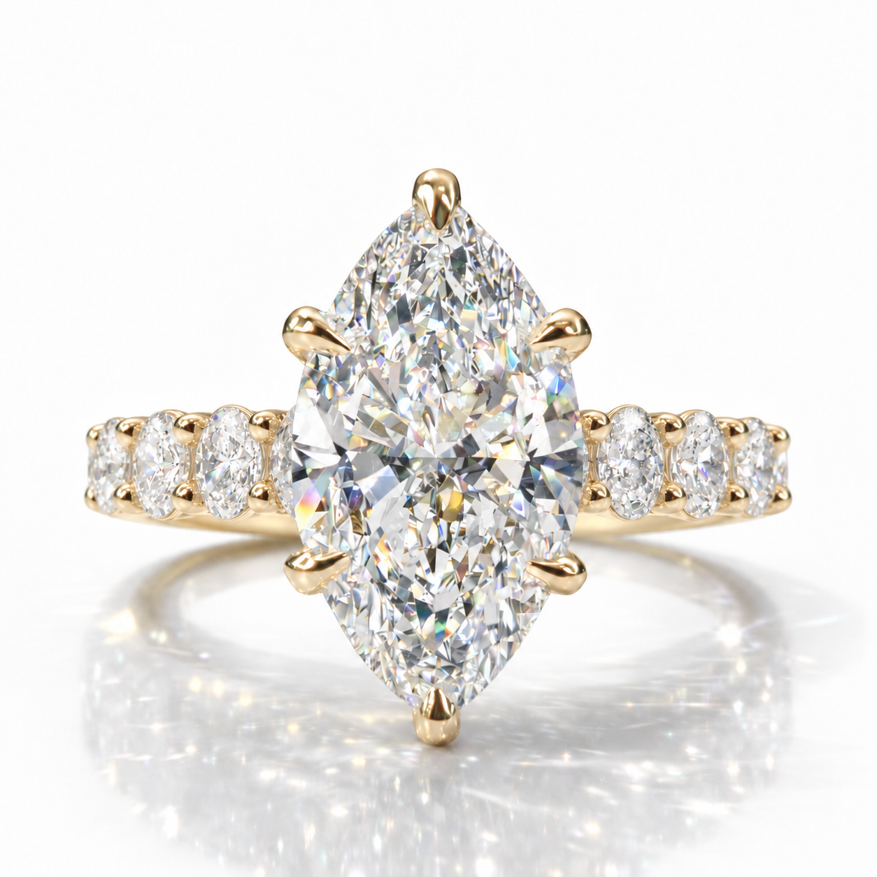 The 3MM Olivia engagement ring with a marquise lab-grown center diamond in yellow gold