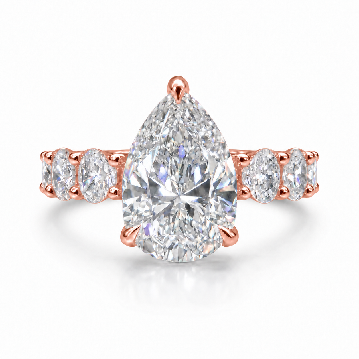 The 3MM Olivia engagement ring with a pear lab-grown center diamond in rose gold