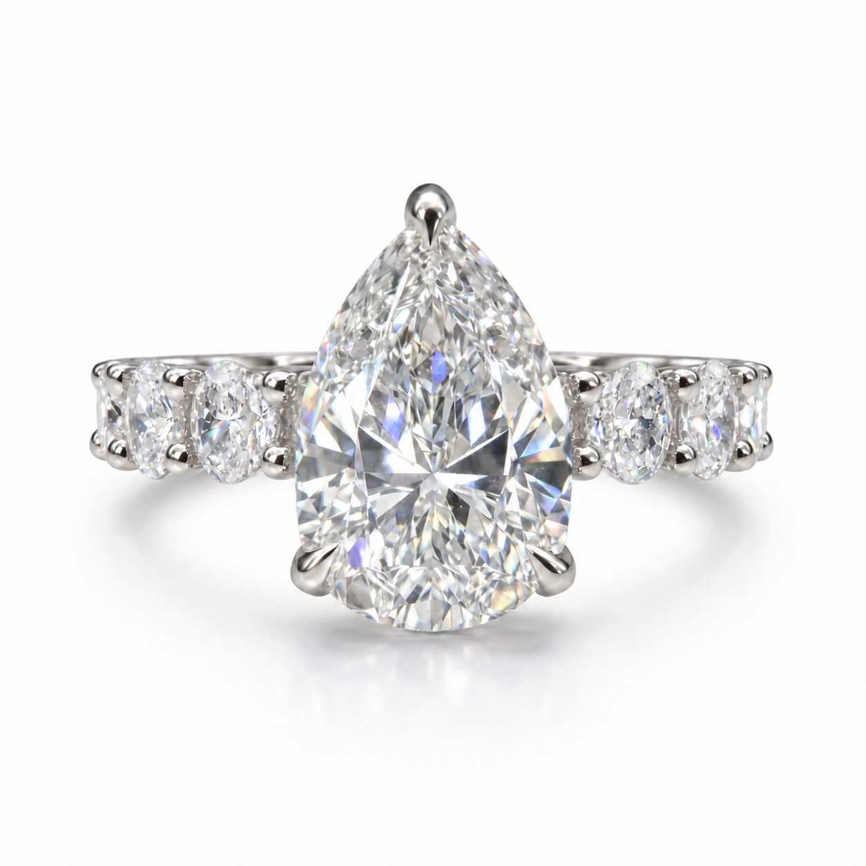 The 3MM Olivia engagement ring with a pear lab-grown center diamond in a white-metal finish