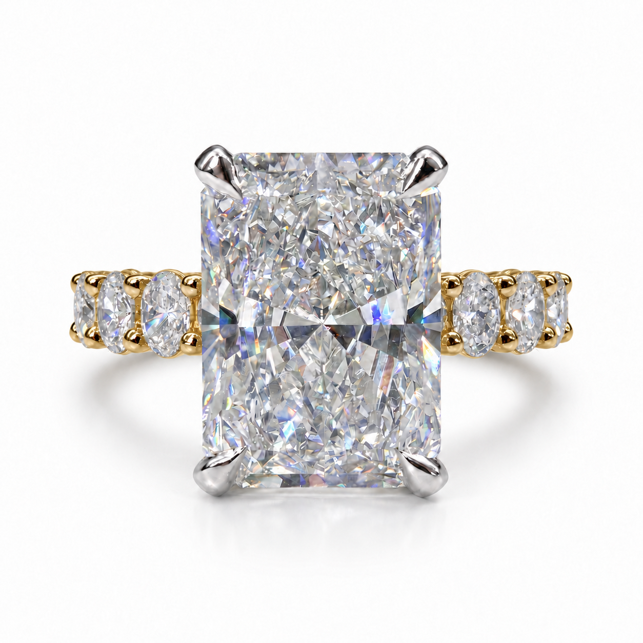 The 3MM Olivia engagement ring with a radiant lab-grown center diamond in two-tone gold with white center prongs