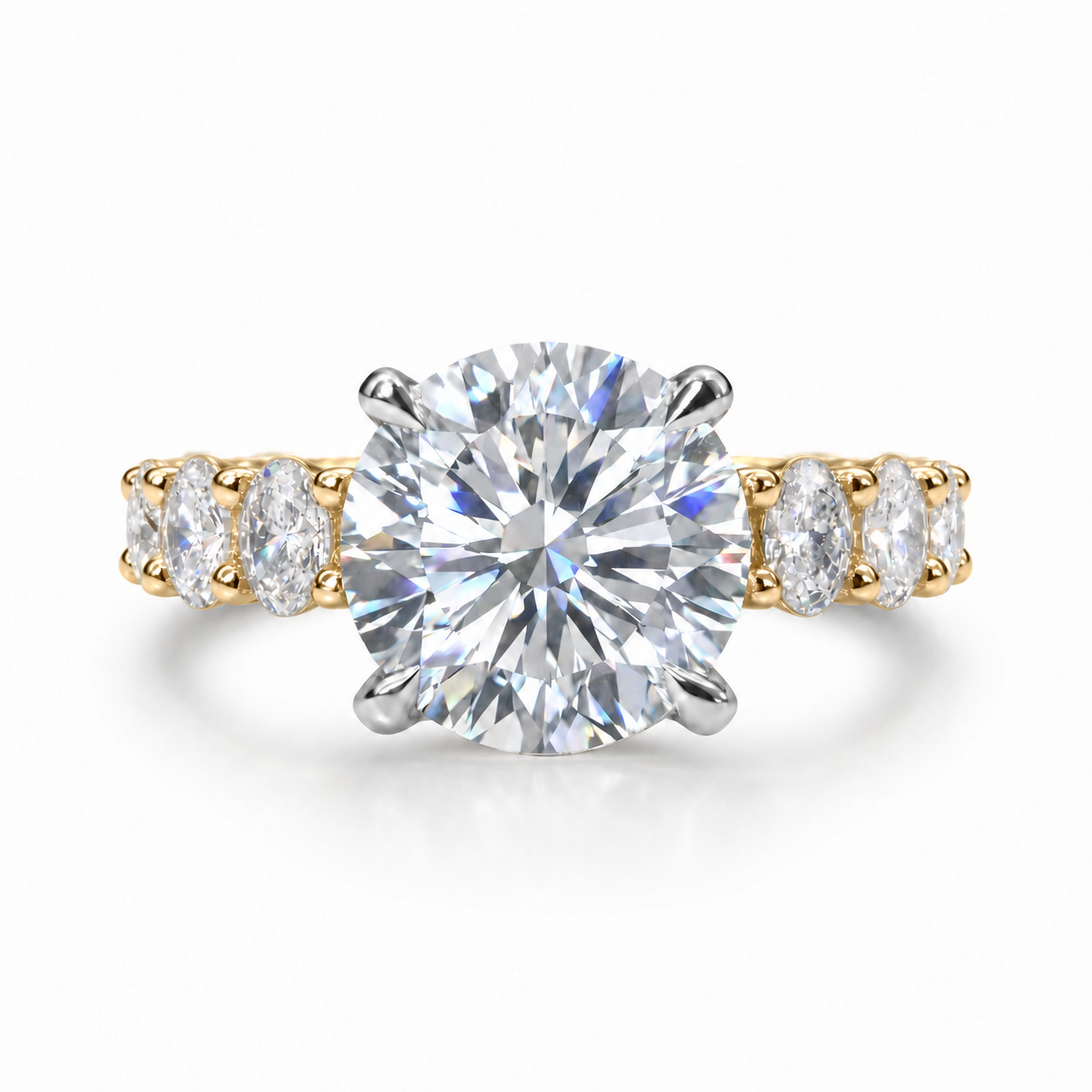 The 3MM Olivia engagement ring with a round lab-grown center diamond in two-tone gold with white center prongs